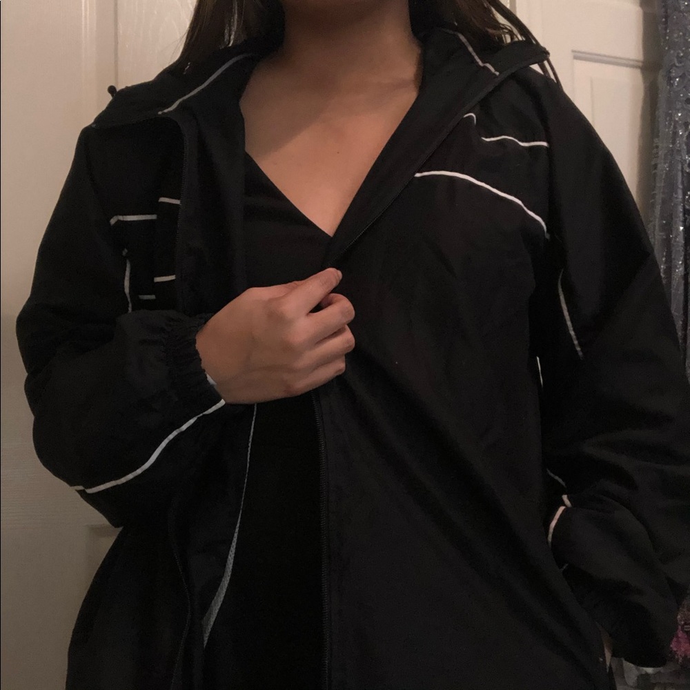 Black windbreaker with white detailing